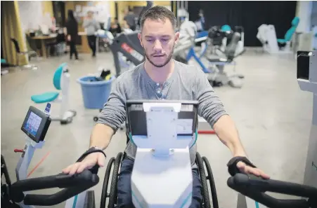 ??  ?? Brad Skeats, who has a spinal-cord injury, works out at the Physical Activity Research Centre, run by the Internatio­nal Collaborat­ion on Repair Discoverie­s, in Vancouver. People with spinal-cord injuries are advised to have 30 minutes of...