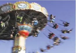  ??  ?? So much of this classic seaside amusement park — and its approach to fun in the sun — remains as timeless as Beach Boys’ harmony. You can choose to cruise the boardwalk and hop on one of the many rides or stroll the sands below.