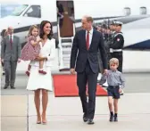  ?? BARTLOMIEJ ZBOROWSKI, AFP/GETTY IMAGES ?? Kate, Duchess of Cambridge, and Prince William will give Prince George and Princess Charlotte a brother or sister in a few months. Kate is said to be having acute morning sickness.