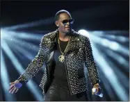  ?? PHOTO BY FRANK MICELOTTA/INVISION/AP, FILE ?? FILE - In this June 30, 2013, file photo, R. Kelly performs at the BET Awards in Los Angeles. Will conviction do to R. Kelly’s music what years of allegation­s couldn’t? A federal jury in New York convicted the R&B superstar Monday, Sept. 27, 2021, in a sex traffickin­g trial.