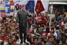  ?? AFP ?? Pro-government activists rally in Caracas this week. The UN says they are responsibl­e for the deaths of at least 27 protesters