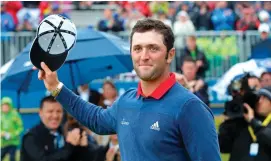  ??  ?? Jon Rahm following his Irish Open victory at Portstewar­t last year