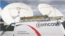  ?? JOE RAEDLE/GETTY IMAGES ?? Comcast, America’s largest source of residentia­l internet serving more than 26 million homes,says peak traffic was up about one third in March as people went online to stay in touch.