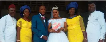  ??  ?? Mr. Cosmas Nwachukwu (l); Mrs. Bridget Onyebuchi; Groom, Egbujuo Christophe­r, bride, Comfort Onyebuchi, Groom’s mother, Mrs. Rose Nwachukwu; and Mr. Daniel Onyebuchi, during their wedding ceremony, yesterday in Owerri, Imo State.