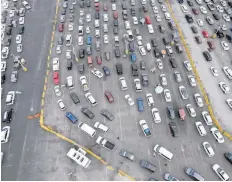  ?? — AFP ?? Aerial view of San Ysidro crossing port on the Mexican side of the US - Mexico border in Tijuana, Baja Caifornia state, on August 20, 2021. The US announced on Friday that it will allow entry to foreign travellers who are fully vaccinated against Covid-19, by both land and air, starting November 8.