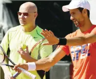  ??  ?? Novak Djokovic (R) and Andre Agassi.