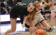  ?? PHOTO BY TOM SILKNITTER ?? West Chester’s Leah Johnson (right) dives for a loose ball in action earlier this season.