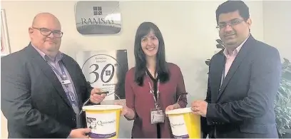  ??  ?? Greg O’Neill, general manager at Renacres Hospital, Lucy Smith, community fundraiser at Queenscour­t Hospice, and Shayan Amjad, finance manager at Renacres