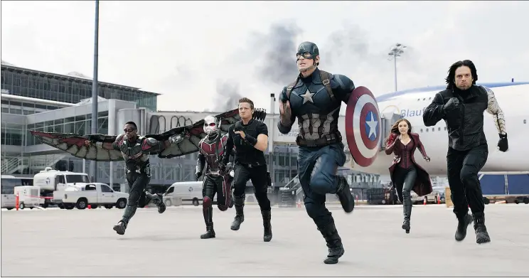  ?? — PHOTOS: MARVEL ?? Anthony Mackie, left, Paul Rudd, Jeremy Renner, Chris Evans, Elizabeth Olsen and Sebastian Stan prepare to battle colleagues in Captain America: Civil War.