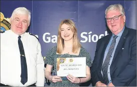  ?? (Pic: Garda Paul Murphy) ?? Receiving her award on Thursday night was Glenville’s Ava McKenna, pictured here with Fermoy Chief Superinten­dent Con Cadogan (left) and Pat McDonagh, Supermac’s.