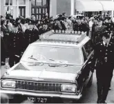  ??  ?? Tragic: The remains of Gda Henry Byrne arrive at Knock Parish Church in July 1980 for his funeral mass.