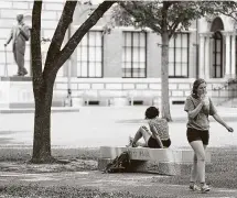  ?? Houston Chronicle file ?? Rice University students walk the campus in 2014. Fall classes start Aug. 23.
