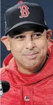  ?? ELISE AMENDOLA THE ASSOCIATED PRESS FILE PHOTO ?? When the league decided in 2020 that extra-inning games would include placing a base runner on second base to start each half-inning, Alex Cora pushed for chaos.