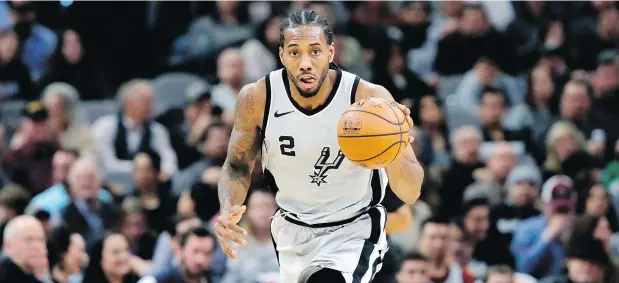  ?? — THE ASSOCIATED PRESS FILES ?? San Antonio Spurs forward Kawhi Leonard was injured most of the past season and his future remains a question.