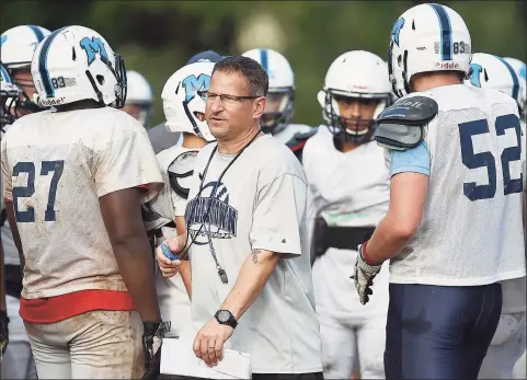  ?? Catherine Avalone / Hearst Connecticu­t Media ?? Middletown head coach Sal Morello says the offensive and defensive lines will be a strength for his team this season.