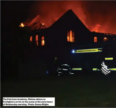  ?? Photo: Donna Blighe ?? The Patrician Academy, Mallow ablaze as firefighte­rs arrive on the scene in the early hours of Wednesday morning.