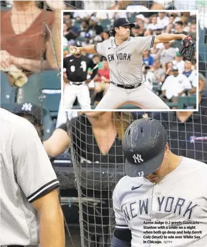  ?? GETTY ?? Aaron Judge (r.) greets Giancarlo Stanton with a smile on a night when both go deep and help Gerrit Cole (inset) to win over White Sox in Chicago.