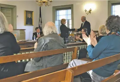  ?? BY LUKE CHRISTOPHE­R/RAPPAHANNO­CK NEWS ?? Jim Northup, retired superinten­dent of Shenandoah National Park, accepts the board's recognitio­n from County Administra­tor Deborah Keyser.