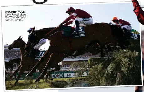  ??  ?? ROCKIN’ ROLL: Davy Russell clears the Water Jump on winner Tiger Roll