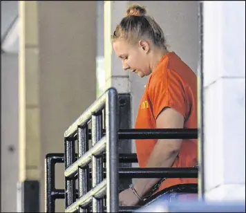 ?? HYOSUB SHIN / HSHIN@AJC.COM ?? Reality Winner leaves the Federal Justice Center after her bond hearing Thursday. U.S. Magistrate Judge Brian Epps denied her release on bond, citing the weight of evidence, among other reasons.