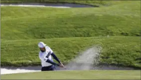  ?? ALASTAIR GRANT — THE ASSOCIATED PRESS ?? Tony Finau of the US plays out of a bunker on the 9th green during a practice round at Le Golf National in Saint-Quentin-en-Yvelines, outside Paris, France, Tuesday, Sept. 25, 2018. The 42nd Ryder Cup will be held in France from Sept. 28-30, 2018 at Le Golf National.