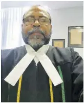  ?? ?? Supreme Court judge David Batts prepares for work.