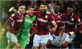  ??  ?? Goalkeeper Jed Steer celebrates with his Aston Villa teammates after saving two penalties in the crucial shootout. Photograph: Nick Potts/PA