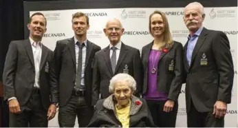  ?? CHRIS YOUNG/THE CANADIAN PRESS ?? From left, Mike Weir, Simon Whitfield, Dr. Charles Tator, Cindy Klassen, Lanny McDonald and Kay MacBeth (front) were inducted into Canada’s Sports Hall of Fame on Thursday.