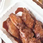  ??  ?? Spicy K Pop wings from Meshikou Chikin