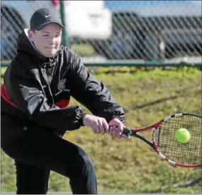  ?? PETE BANNAN — DIGITAL FIRST MEDIA ?? Coatesvill­e’s Ryan Stellato returns a volley from Kennett’s Trent Harner as the Red Raiders hosted Kennett in boys tennis action Wednesday.