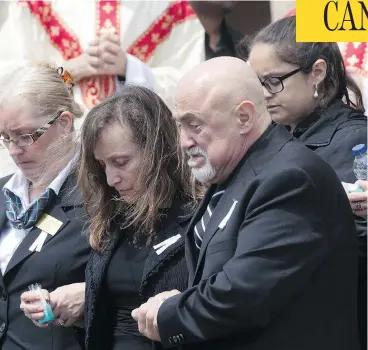  ?? CHRIS YOUNG / THE CANADIAN PRESS ?? Rocco and Carmela D’Amico follow the casket of their daughter Anne Marie following her funeral service in Toronto on Wednesday. D’Amico was one of the 10 victims of last Monday’s van attack on Yonge Street.