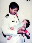  ??  ?? Samantha with his son after receiving two gallantry medals from the then President on Feb 4, 1996 (eight months before his death)