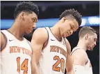  ??  ?? The Knicks, including Allonzo Trier (14), Kevin Knox (20) and Mario Hezonja, are 11-47. RAJ MEHTA/USA TODAY SPORTS