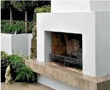  ?? SUPPLIED ?? A plastered masonry and fire-brick unit sits in a garden designed by Keren McDonnell.