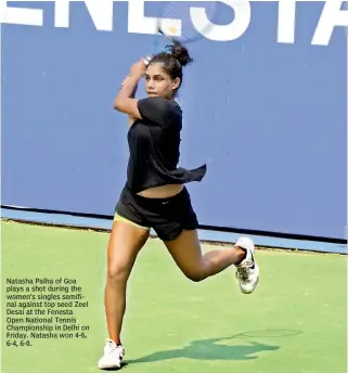  ??  ?? Natasha Palha of Goa plays a shot during the women’s singles semifinal against top seed Zeel Desai at the Fenesta Open National Tennis Championsh­ip in Delhi on Friday. Natasha won 4-6, 6-4, 6-0.