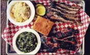  ?? DAMON HIGGINS / THE PALM BEACH POST ?? Brisket, ribs, cornbread, macaroni and greens at Brother Jimmy’s BBQ in CityPlace.