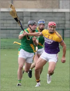  ??  ?? Lee Chin of Faythe Harriers battles with Sean Murphy of Buffers Alley.