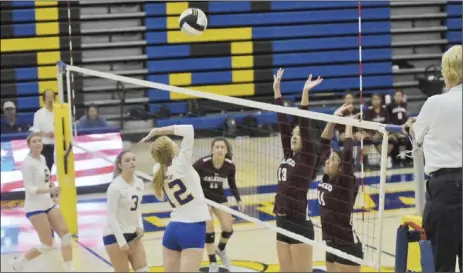  ?? PHOTO AARON BODUS ?? Brawley’s Lindsay Lemert (12) looks to shoot one past Calexico’s Julissa Cecena (13) and Yasmin Sanchez (14) during the Wildcats’ 3-0 home win over the Bulldogs on Tuesday.