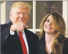  ?? Mandel Ngan / AFP/Getty Images ?? In this photo taken on March 29, 2018, President Donald Trump points to former communicat­ions director Hope Hicks, of Greenwich, shortly departing from the White House