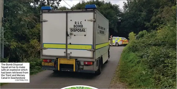  ?? CONTRIBUTE­D ?? The Bomb Disposal Squad arrive to make safe an explosive which had been retrieved from the Trent and Mersey Canal in Swarkeston­e