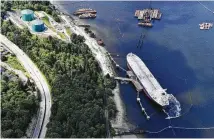  ?? Jonathan Hayward / Canadian Press via Associated Press ?? Kinder Morgan’s Trans Mountain marine terminal is in Burnaby, British Columbia. The pipeline is being expanded.