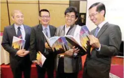  ??  ?? From left: Vizione Holdings Bhd CFO Simon Lim, executive director Wong Kwai Wah, chairman Datuk Dr Raman Ismail and Ng after its AGM in Kuala Lumpur yesterday.