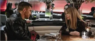  ?? JAY MAIDMENT/SONY PICTURES ENTERTAINM­ENT ?? Tom Hardy and Michelle Williams star in “Venom: Let There Be Carnage.”