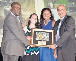  ??  ?? Hospitalit­y Personalit­y of the Year 2014 Dr Cecil Cornwall (left) presents the Best Attraction award to Chukka’s Taylor Carmichael, Romayne McNab, and John Byles.