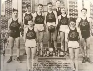  ?? Photograph courtesy of Pea Ridge Historical Society ?? PRHS Basketball District Champions 1934: front from left, John Black and Lynn Ricketts; back, from left: Klyce Walker, Russell Walker, Hugh Patterson, Nelson Hardy, Pryor Armstrong, Joe Price and Coach L.L. Horn. Won 10 trophies in a four-year period (nine trophies and a $20 bill).
