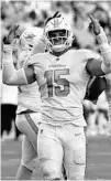  ?? JOHN MCCALL/ SOUTH FLORIDA SUN SENTINEL ?? Dolphins linebacker Jaelan Phillips gestures after sacking Panthers quarterbac­k PJ Walker during the second half Sunday.