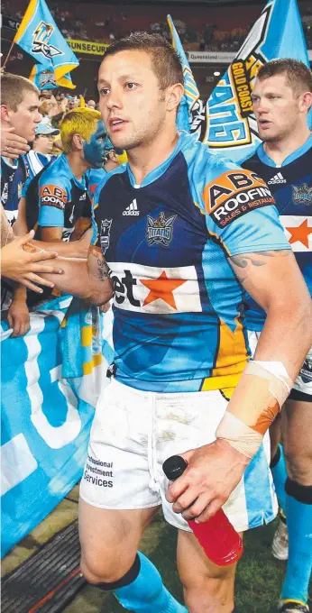  ??  ?? Titans halfback great and our pick to captain the team of the decade during the club’s most successful run back in 2010, when they came within one game of an NRL Grand Final.