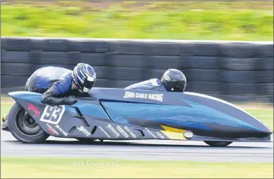  ??  ?? Passenger Oscar Lawrence and driver George Holden at Mallory Park