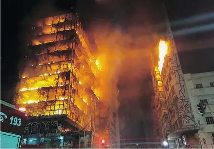  ?? — GETTY IMAGES ?? One person was reportedly killed as flames tore through a building in the heart of Sao Paulo. TV images show the floors of the former police headquarte­rs collapsing like dominoes.