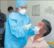  ?? HT PHOTO ?? A health worker taking a swab sample at the Bathinda civil hospital.